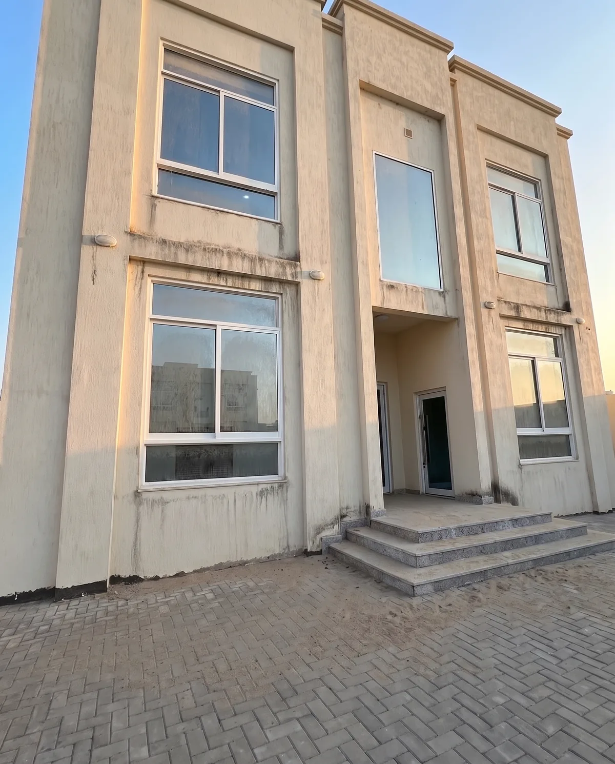 Villa exterior before cleaning