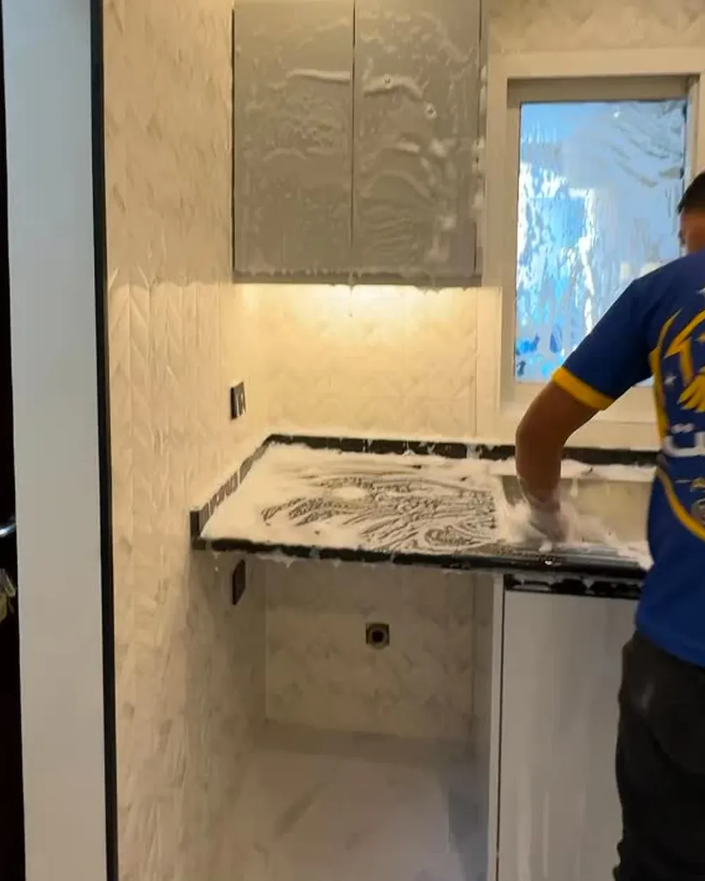 Home Beat crew cleaning a kitchen